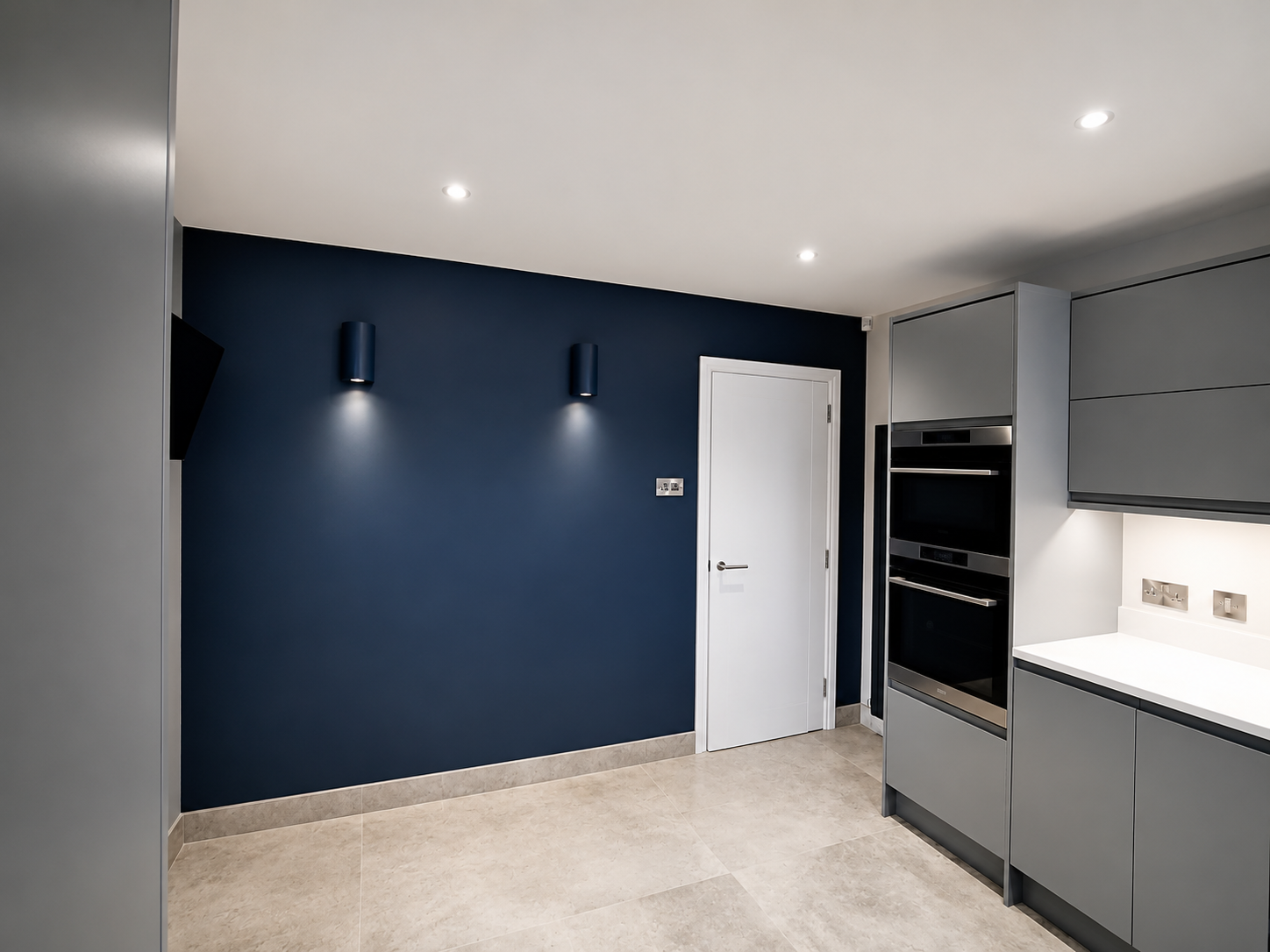 Modern kitchen feature wall painted in Farrow & Ball Stiffkey Blue